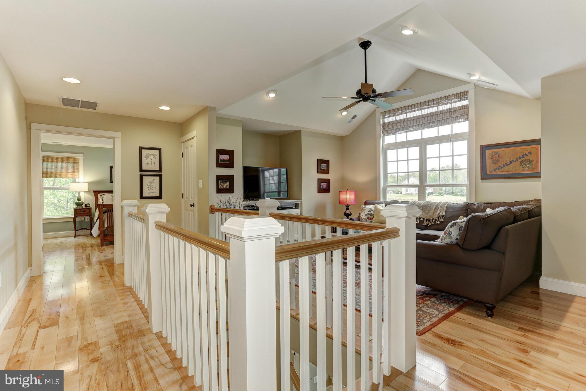 4835 South Polling House Road Lothian, MD 20711 - Photo 17 of 29 Upper Level hallway w/ maple hardwoods