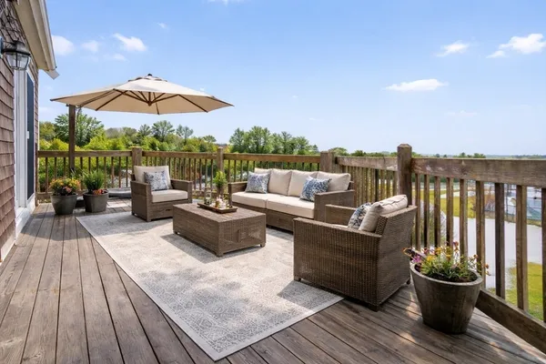 a view of a roof deck with couches