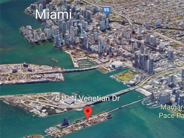 a view of a backyard with sitting area