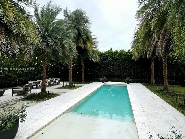 a view of swimming pool from a balcony