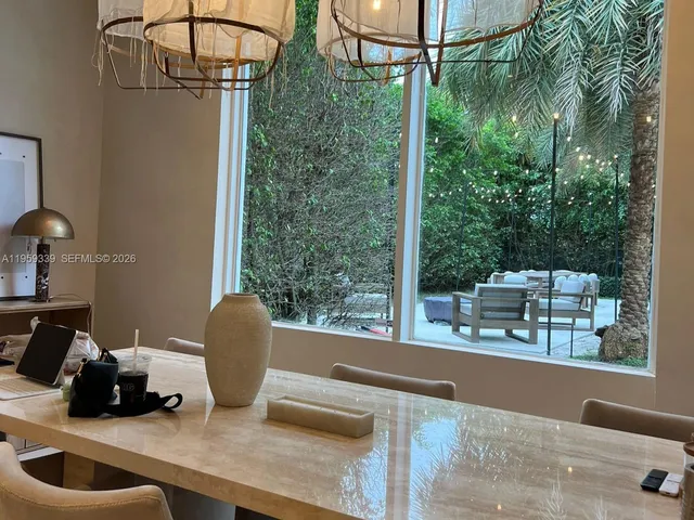 a room with furniture and a flat screen tv