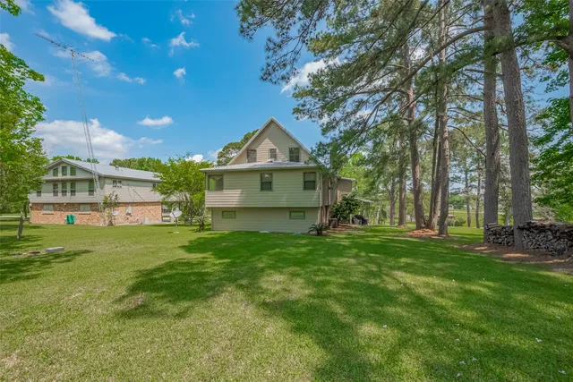 a view of field with trees