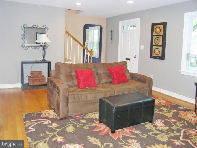 9511 Monroe Street Silver Spring, MD 20910 - Photo 14 of 22 a living room with a couch and a rug