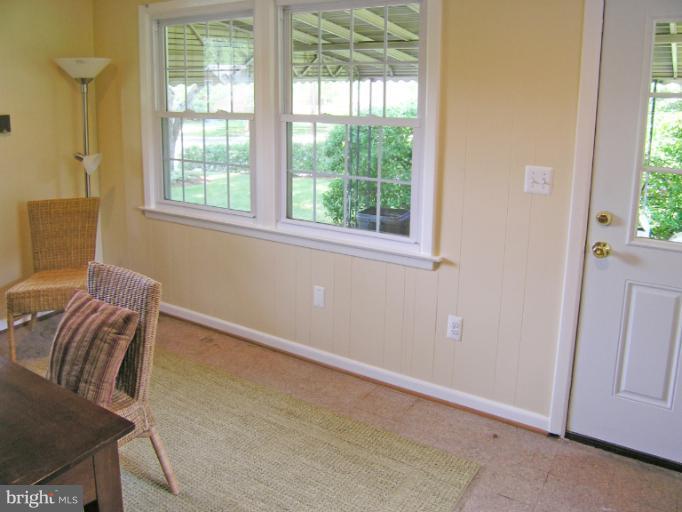 9511 Monroe Street Silver Spring, MD 20910 - Photo 3 of 22 a view of a room with furniture and windows