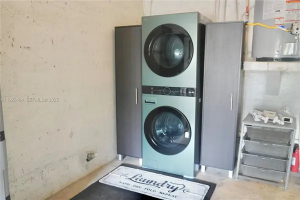 a view of washer and dryer in a utility room