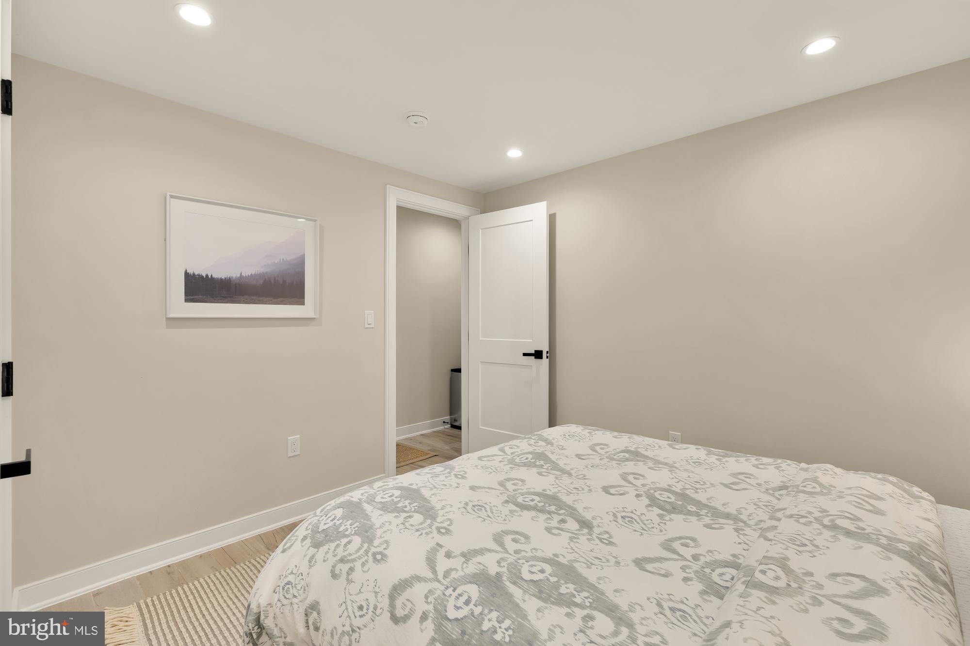 3361 18th Street Northwest Washington, DC 20010 - Photo 45 of 49 a bedroom with a large bed