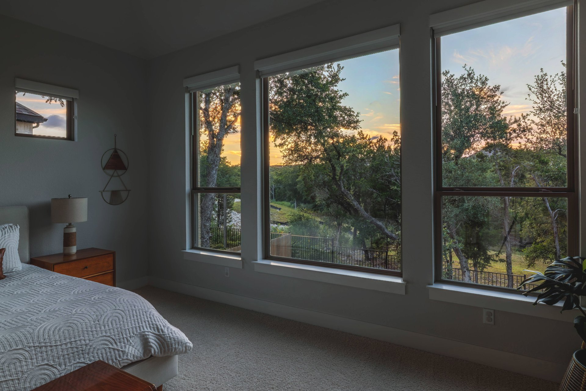 317 Autumn Oak Way Georgetown, TX 78628 - Photo 21 of 40 a bedroom with a bed and a large window