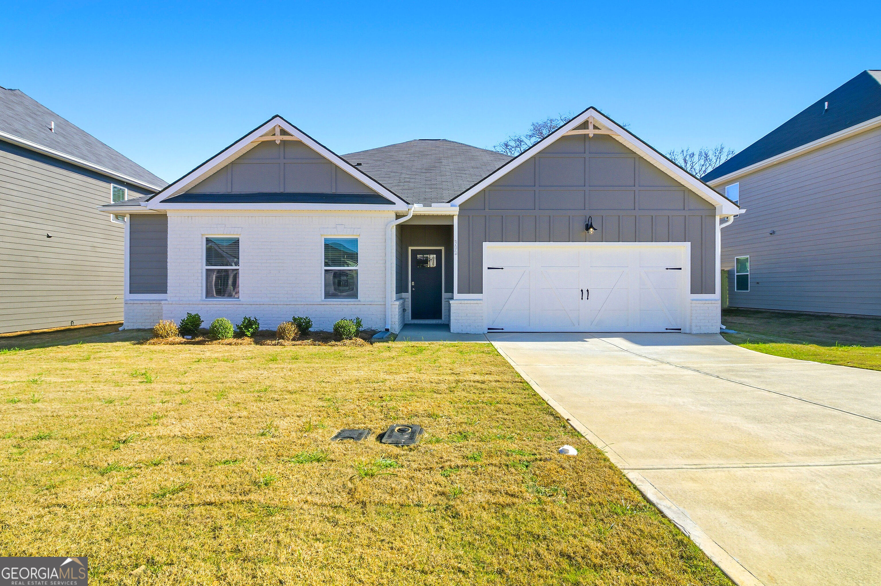 302 Rusty Plow Lane Perry, GA 31069 - Photo 1 of 1 a front view of a house with a yard