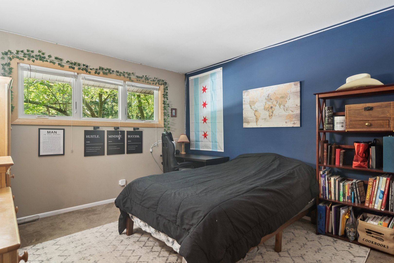170 South Ela Road Barrington, IL 60010 - Photo 19 of 33 a bedroom with a bed and a book shelf