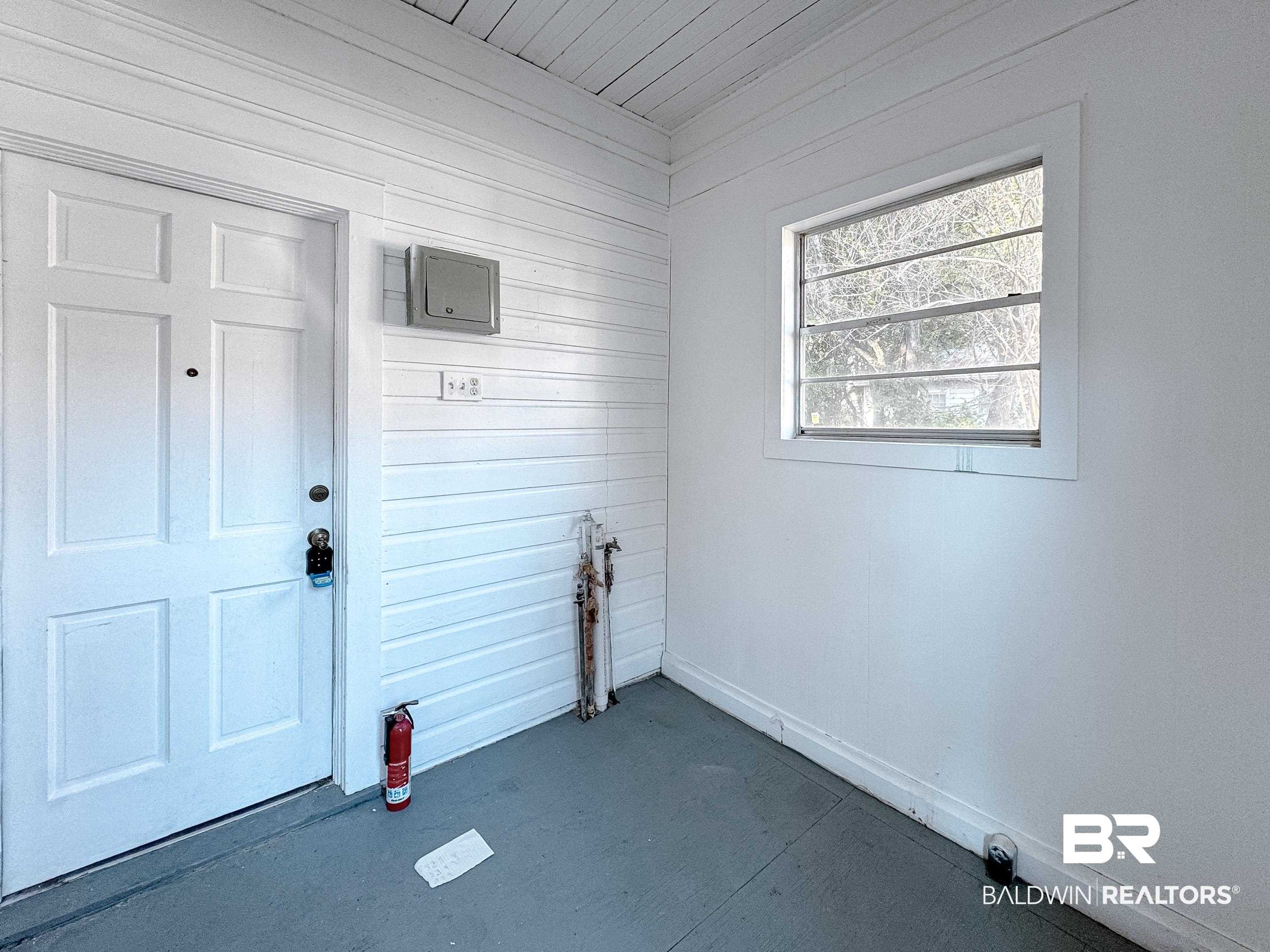 206 1st Street Mobile, AL 36611 - Photo 19 of 26 Washroom with wood walls and wood ceiling
