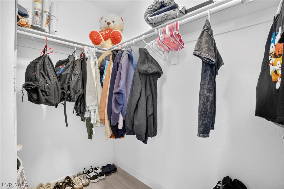 6281 Angora Peak Lane Las Vegas, NV 89115 - Photo 28 of 34 Functional closet space offers ample room for organizing personal belongings and everyday essentials.