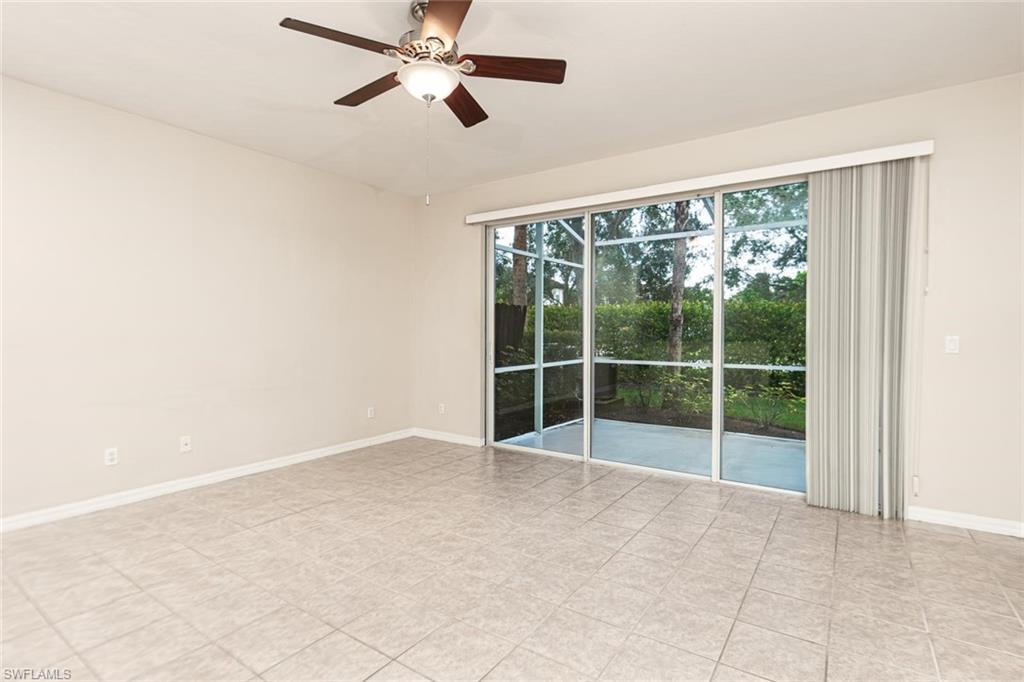 16250 Ravina Way, Unit 87 Naples, FL 34110 - Photo 3 of 15 a view of an empty room with a window