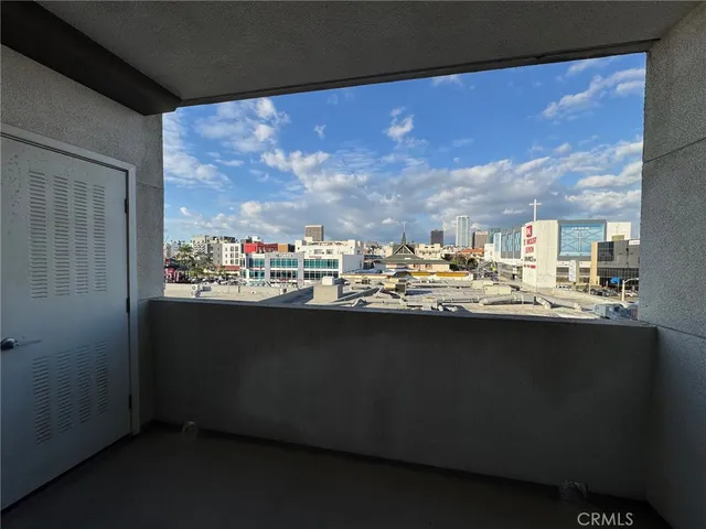 a view of a city from a balcony