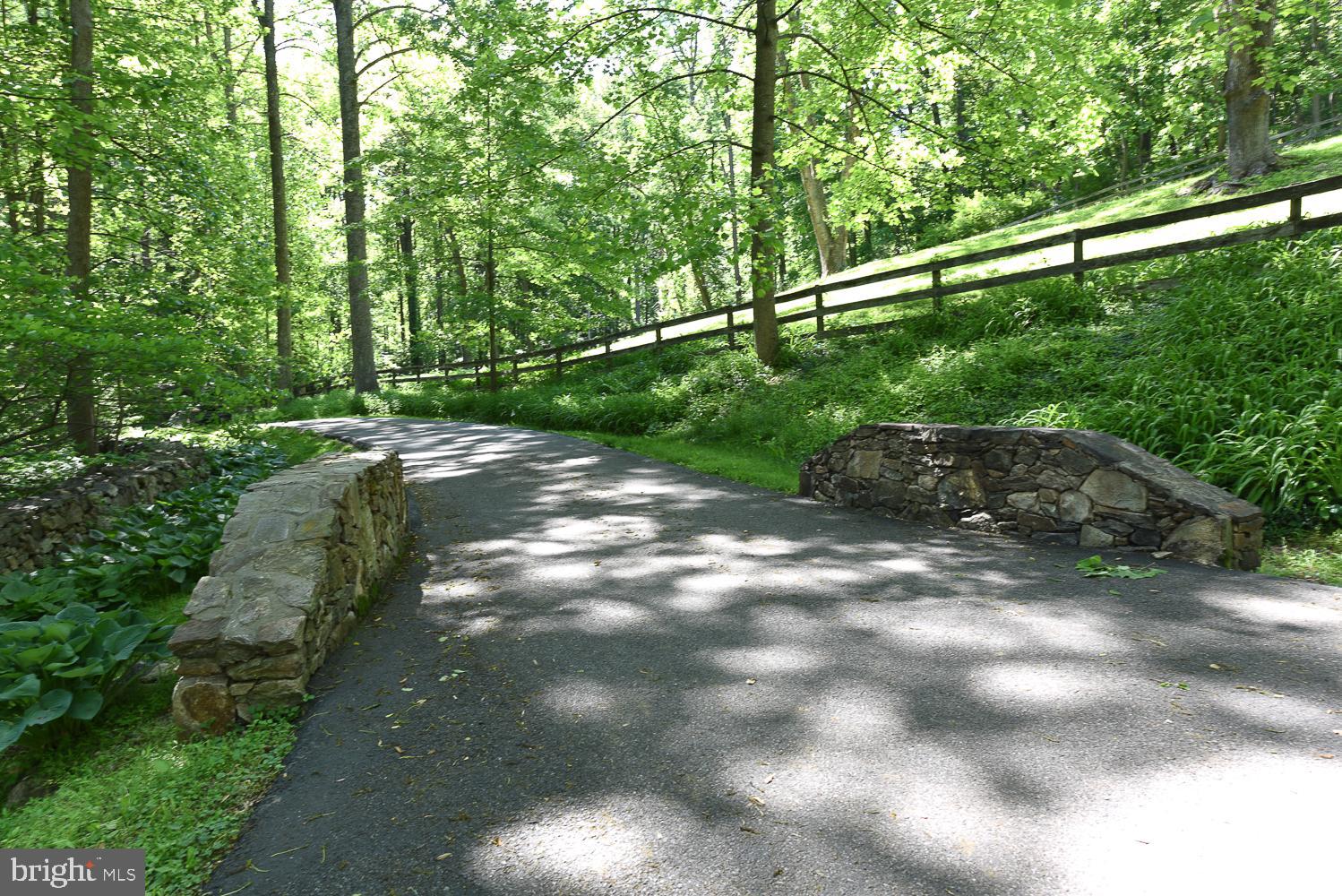 1425 Birchrun Road Chester Springs, PA 19425 - Photo 54 of 59 Arched old stone over small stream leading to Home