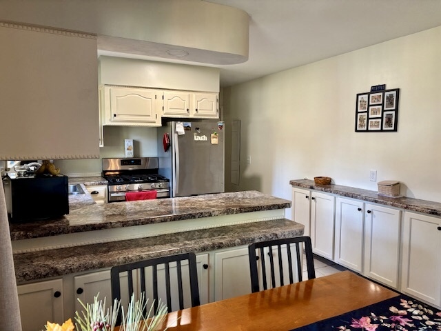 5 Boone Court Normal, IL 61761 - Photo 15 of 29 a kitchen view with stove and cabinets