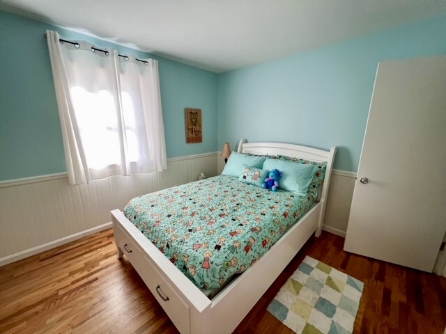 5 Boone Court Normal, IL 61761 - Photo 18 of 29 a bed sitting in a bedroom next to a window