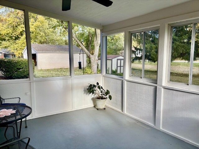 5 Boone Court Normal, IL 61761 - Photo 21 of 29 a view of a room with a large window and table