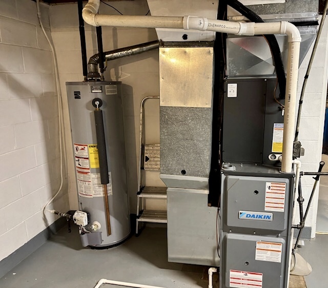 5 Boone Court Normal, IL 61761 - Photo 27 of 29 a view of walk in closet with clothes and shoes