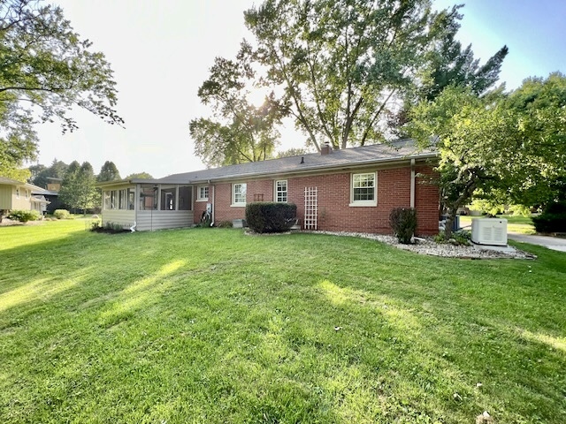 5 Boone Court Normal, IL 61761 - Photo 5 of 29 a front view of house with yard and green space