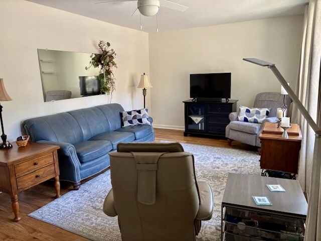 5 Boone Court Normal, IL 61761 - Photo 10 of 29 a living room with furniture and a flat screen tv