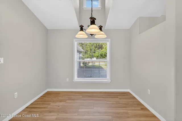 a view of an empty room with window