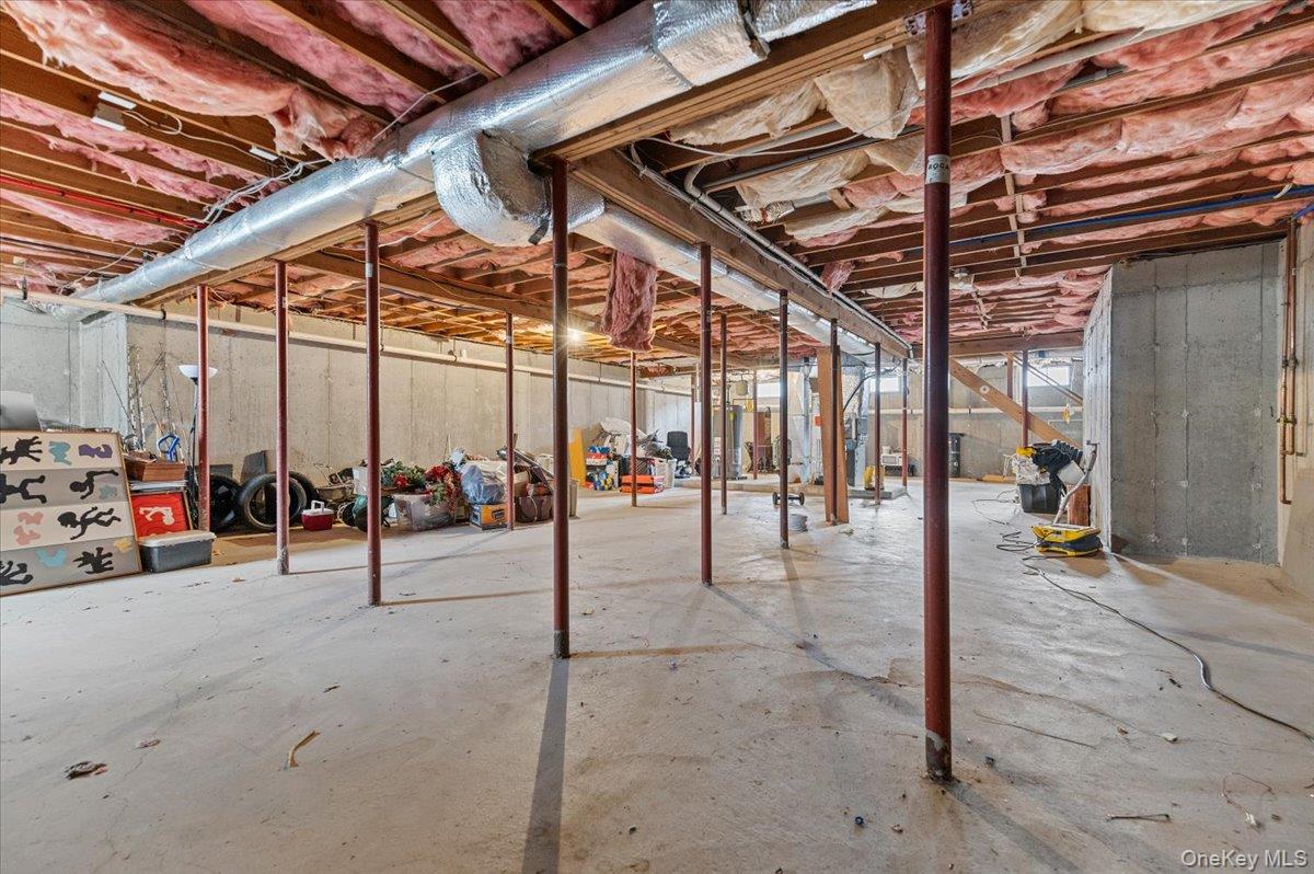 24 Wisteria Drive Remsenburg, NY 11960 - Photo 31 of 44 a view of a room with wooden floor