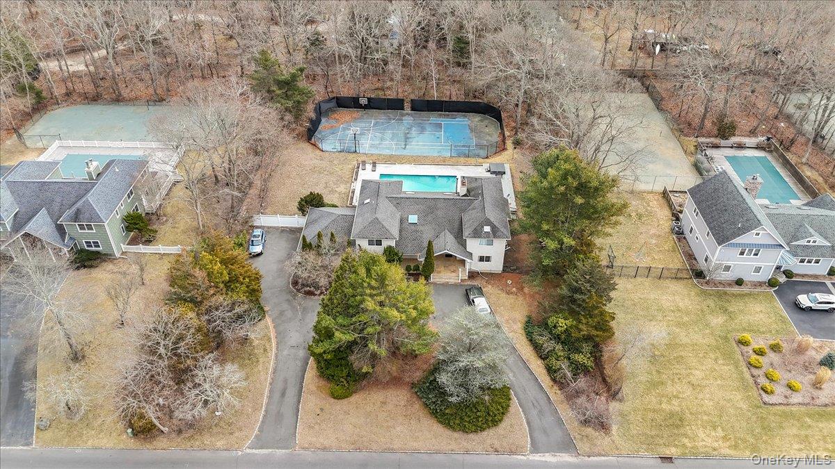 24 Wisteria Drive Remsenburg, NY 11960 - Photo 40 of 44 view of balcony with outdoor space
