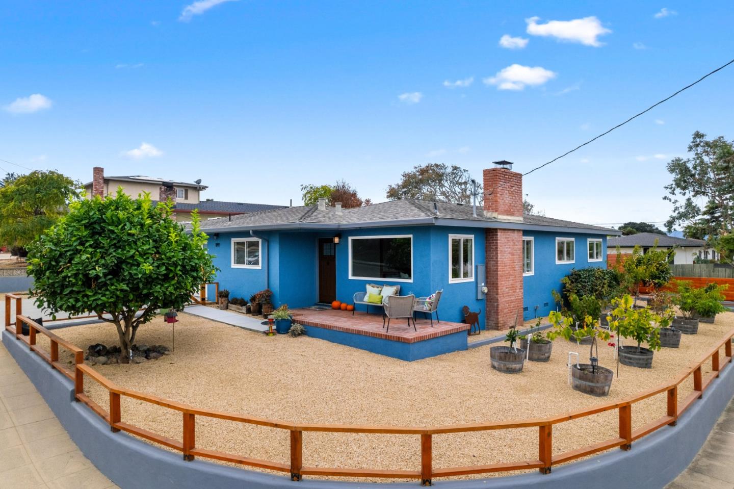 a view of a house with sitting area and furniture