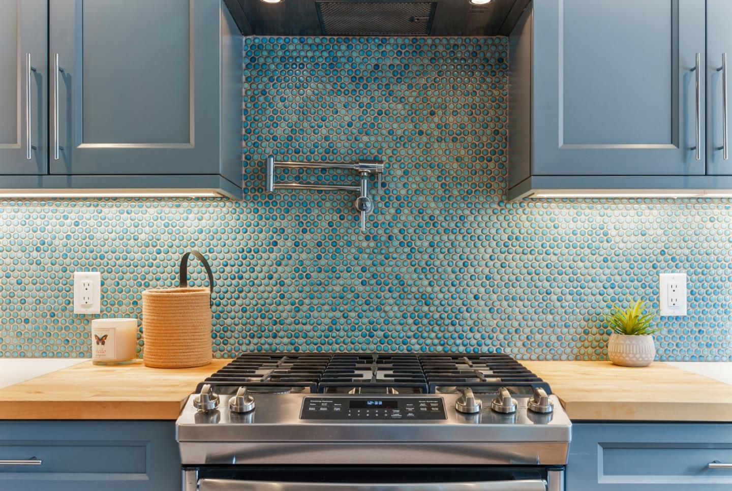1149 Modoc Street Seaside, CA 93955 - Photo 13 of 37 a bathroom with a granite countertop sink a toilet and a mirror