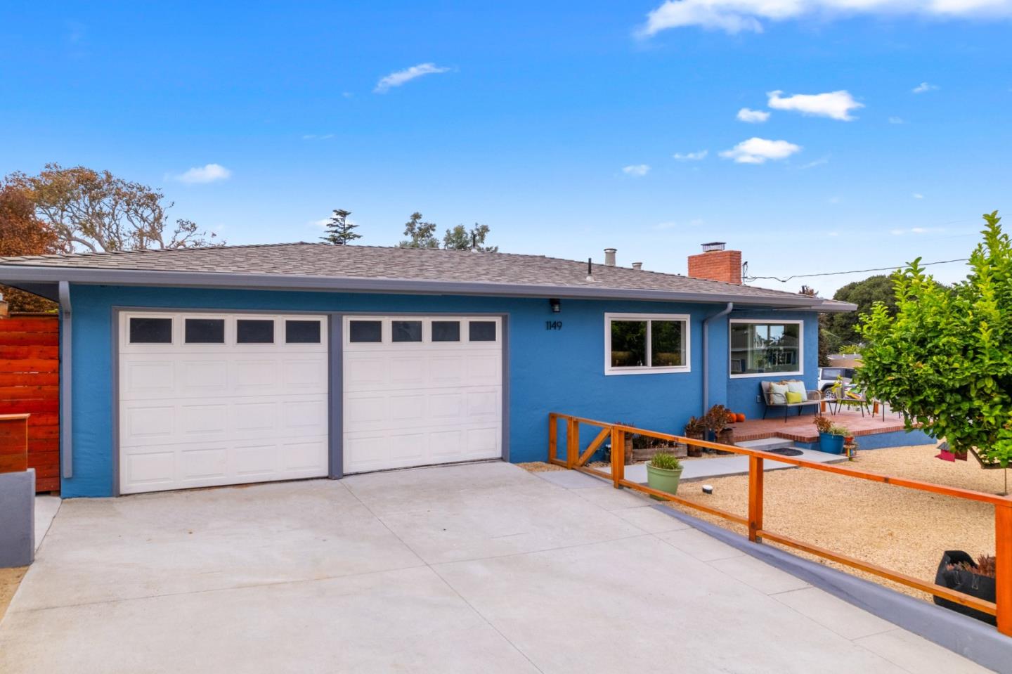 1149 Modoc Street Seaside, CA 93955 - Photo 2 of 37 a view of a house with a backyard and sitting area