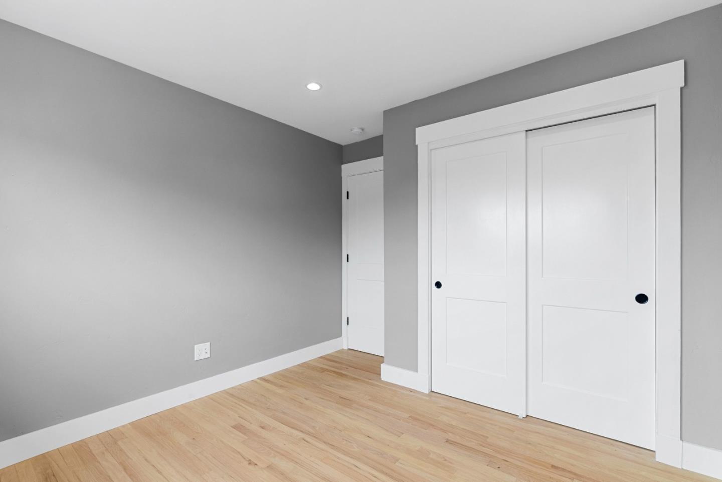 1149 Modoc Street Seaside, CA 93955 - Photo 23 of 37 a view of an empty room with wooden floor