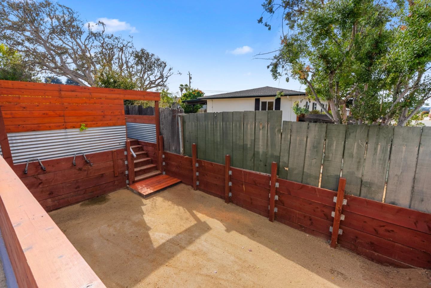 1149 Modoc Street Seaside, CA 93955 - Photo 31 of 37 a backyard of a house with table and chairs