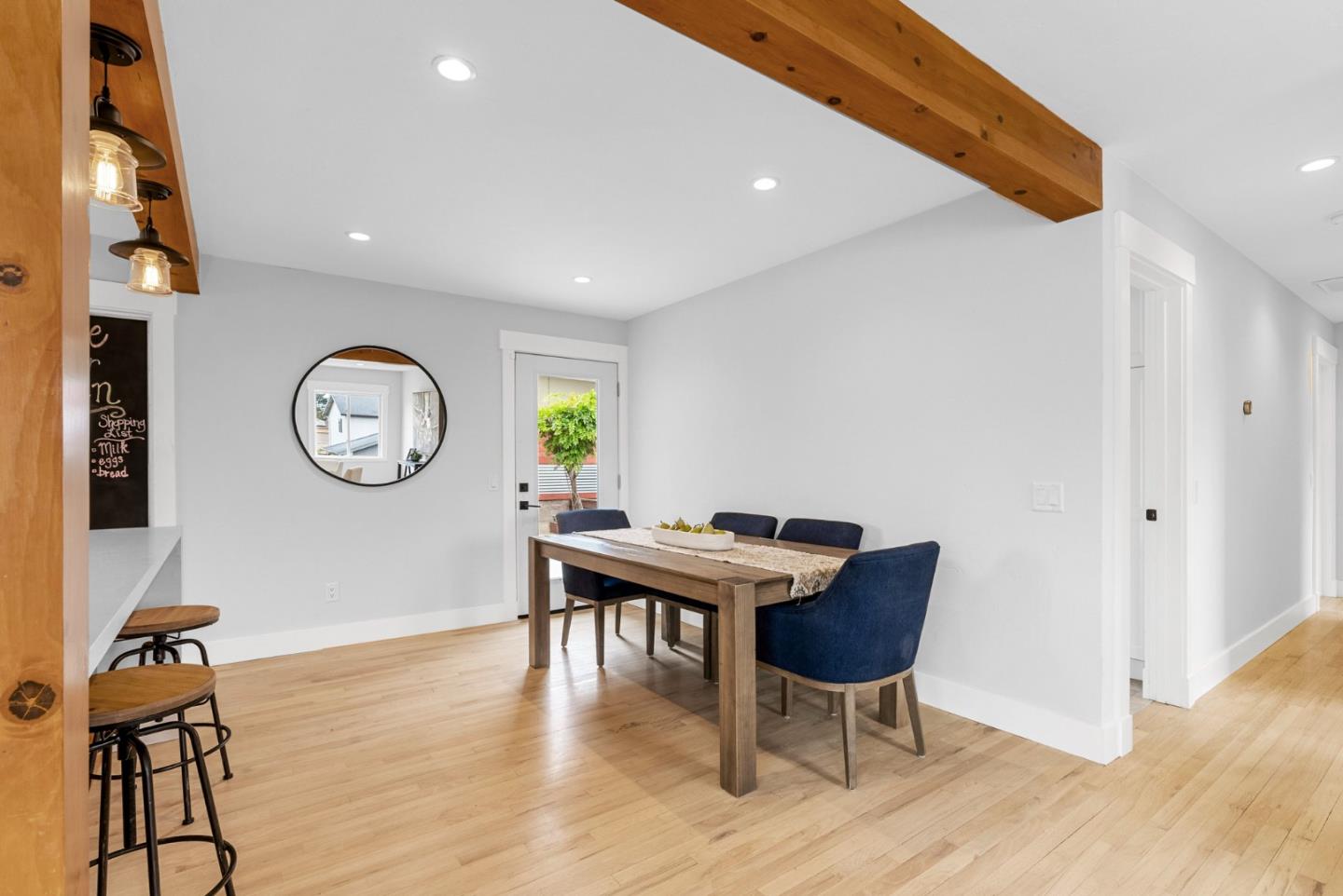 1149 Modoc Street Seaside, CA 93955 - Photo 8 of 37 a view of a dining room with furniture and wooden floor