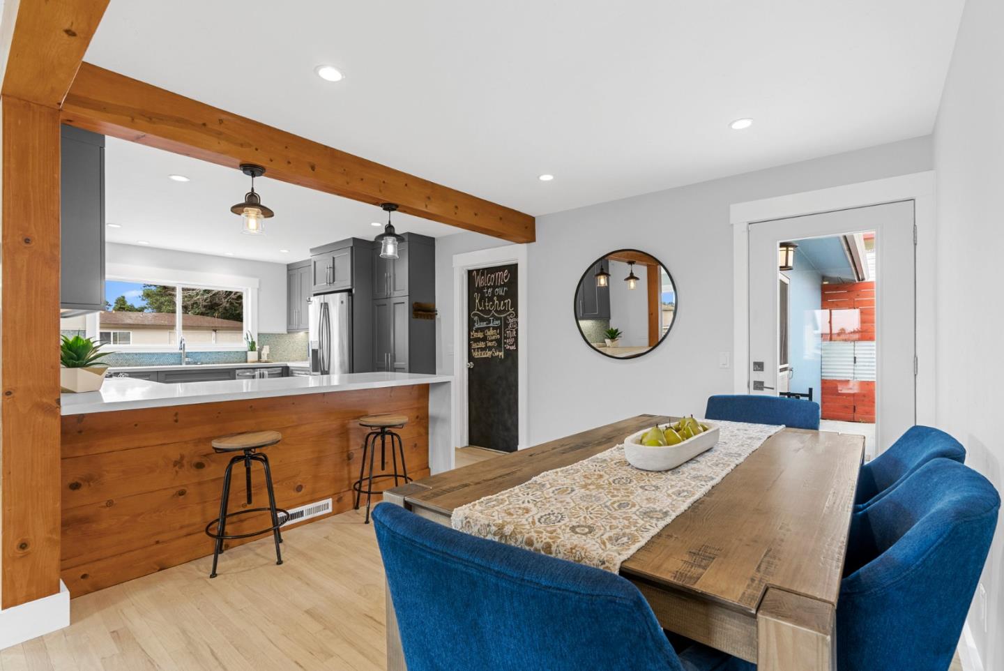 1149 Modoc Street Seaside, CA 93955 - Photo 9 of 37 a living room with faucet a dining table and chairs