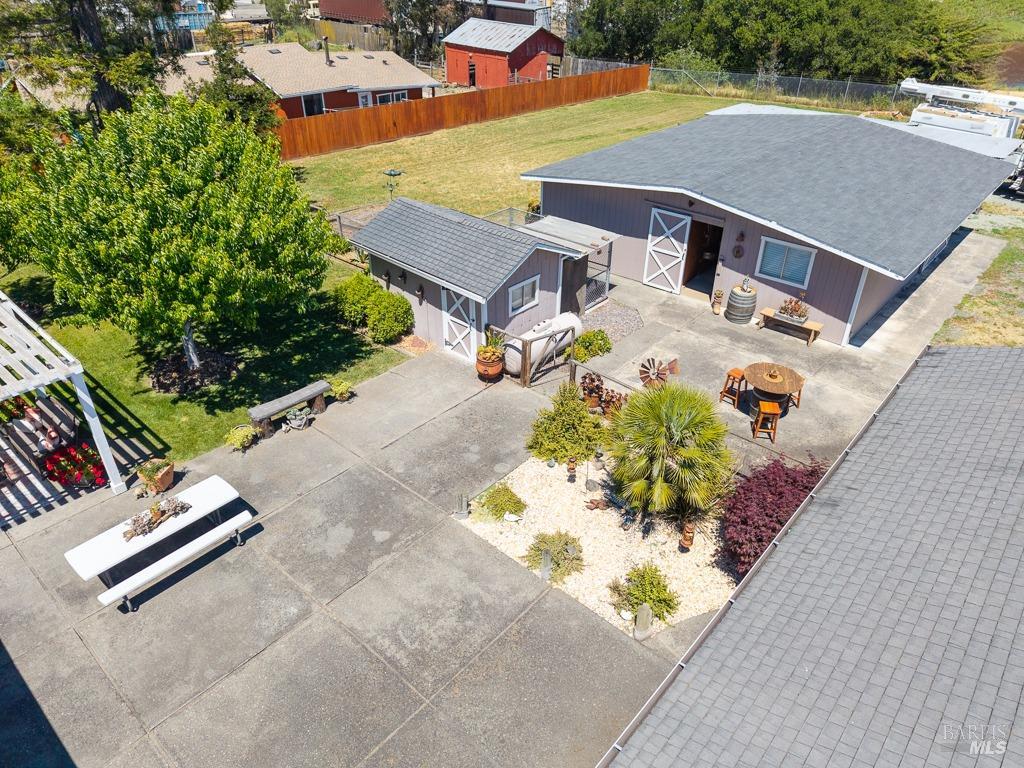 23180 Maffei Road Sonoma, CA 95476 - Photo 13 of 61 Aerial view of enclose gathering area incorporating home and outbuildings.