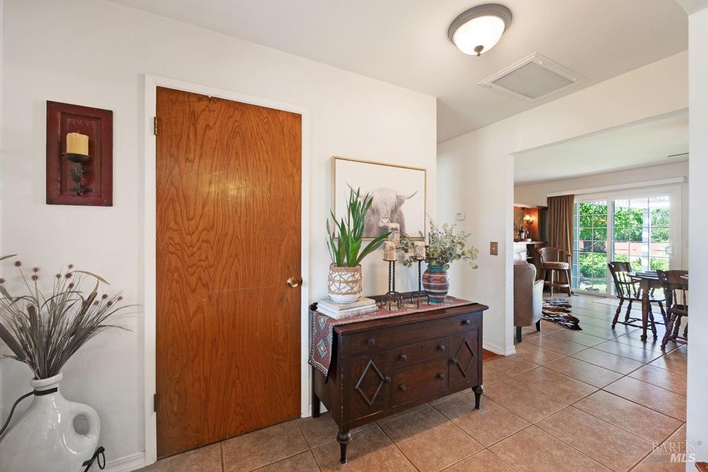 23180 Maffei Road Sonoma, CA 95476 - Photo 15 of 61 Looking from family room to front coat closet to dining area great room.