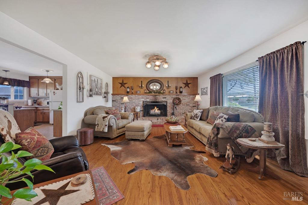 23180 Maffei Road Sonoma, CA 95476 - Photo 16 of 61 Family room opens to kitchen.