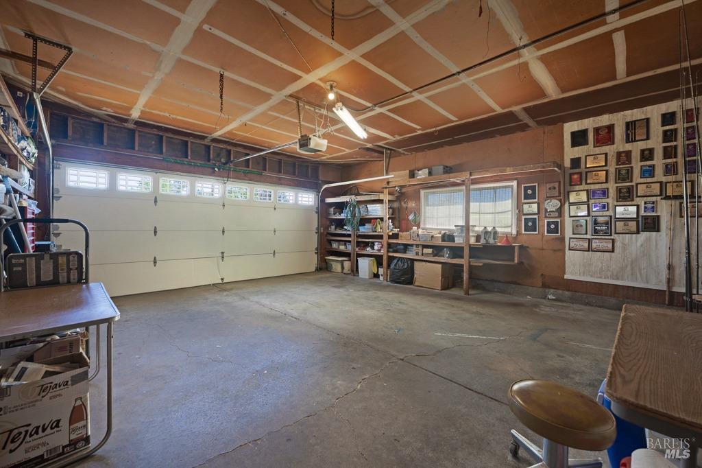23180 Maffei Road Sonoma, CA 95476 - Photo 30 of 61 Attached - 2 car garage with lots of shelves for storage.