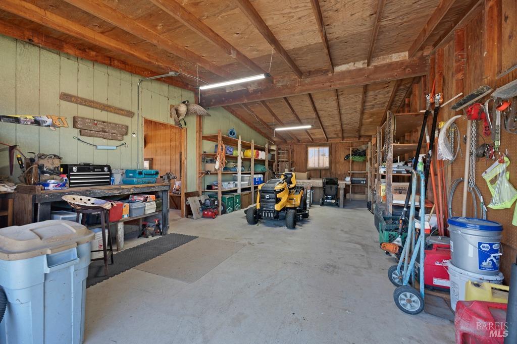 23180 Maffei Road Sonoma, CA 95476 - Photo 52 of 61 Shop you can enter through the bar or there is a large door to slide open for moving equipment in and out.