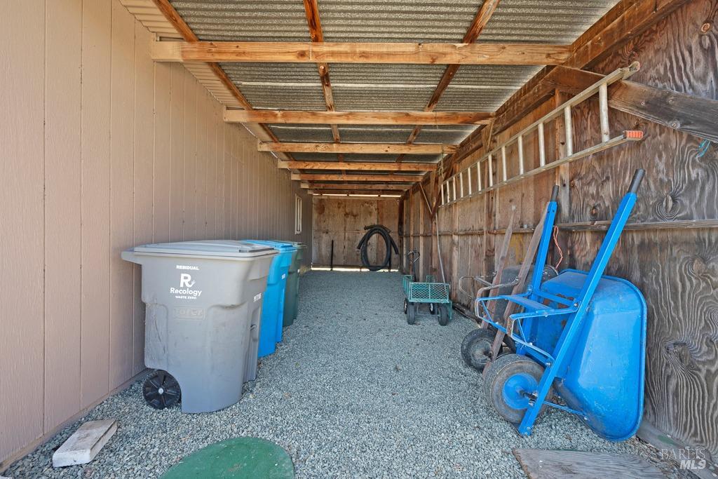 23180 Maffei Road Sonoma, CA 95476 - Photo 53 of 61 Side of shop is a covered area that has been used to store RV.