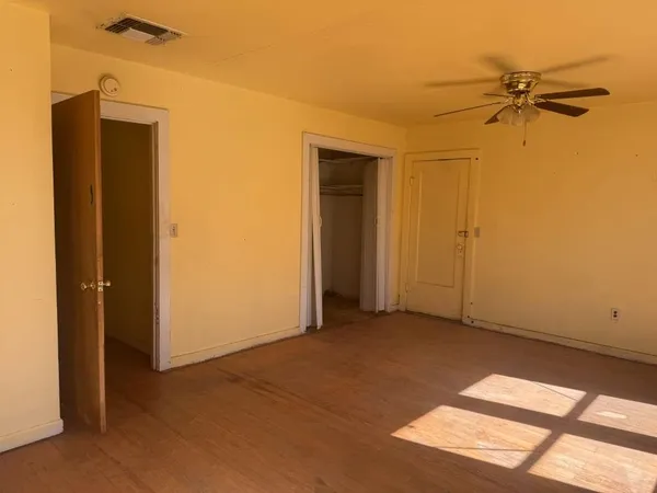 en empty room with windows