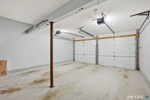 a view of a room with white walls