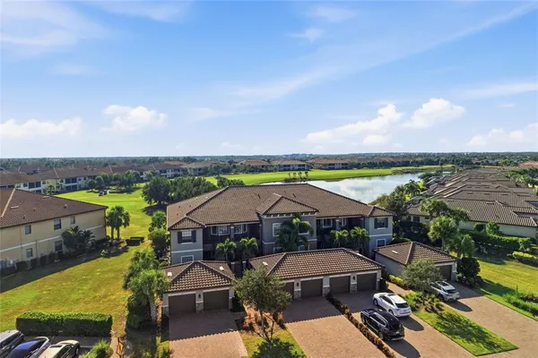 an aerial view of a house with a garden