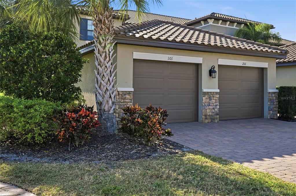 13837 Messina Loop, Unit 101 Bradenton, FL 34211 - Photo 4 of 51 a front view of a house