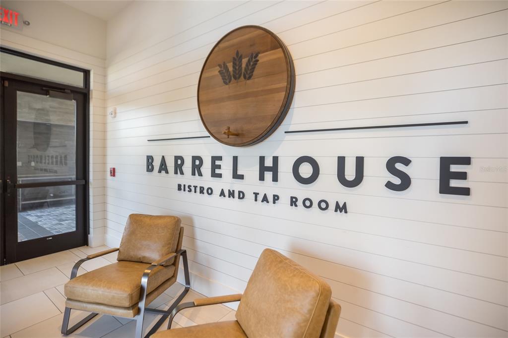 13837 Messina Loop, Unit 101 Bradenton, FL 34211 - Photo 41 of 51 a view of a door and chair in a room