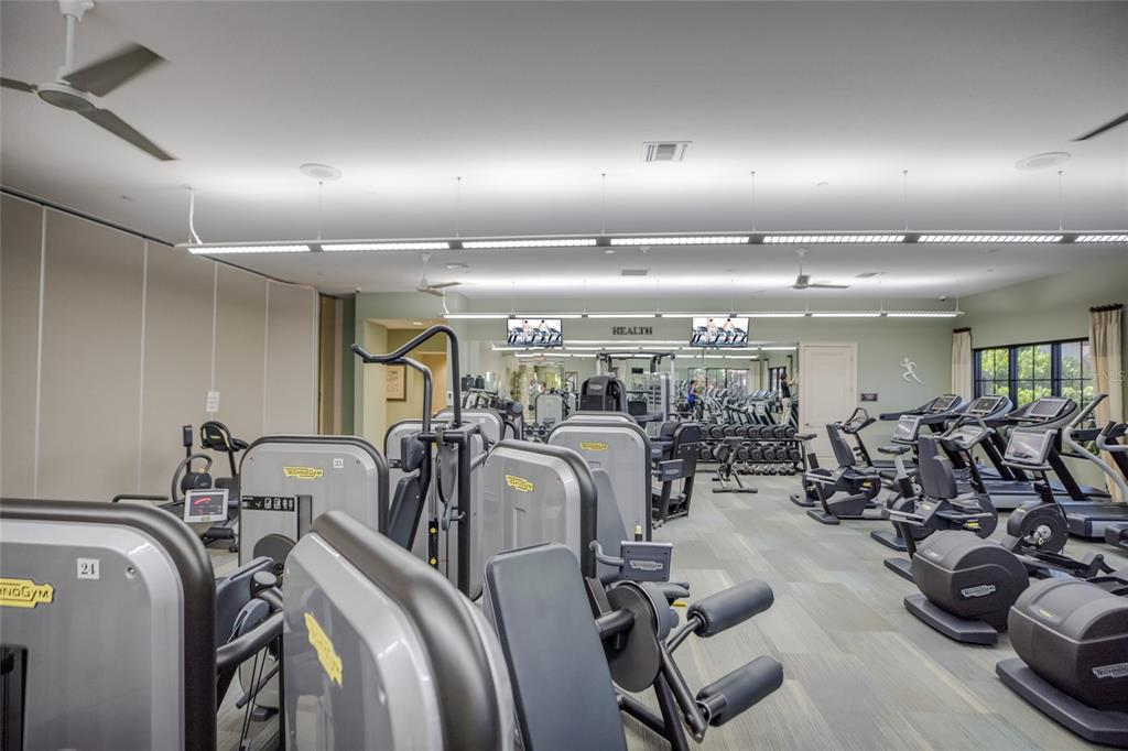 13837 Messina Loop, Unit 101 Bradenton, FL 34211 - Photo 42 of 51 a view of a room with gym equipment
