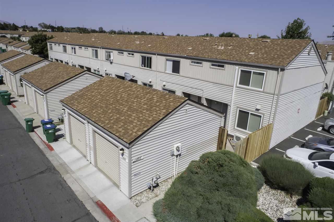 13860 Lear Boulevard Reno, NV 89506 - Photo 1 of 22 an aerial view of a house with a yard and balcony