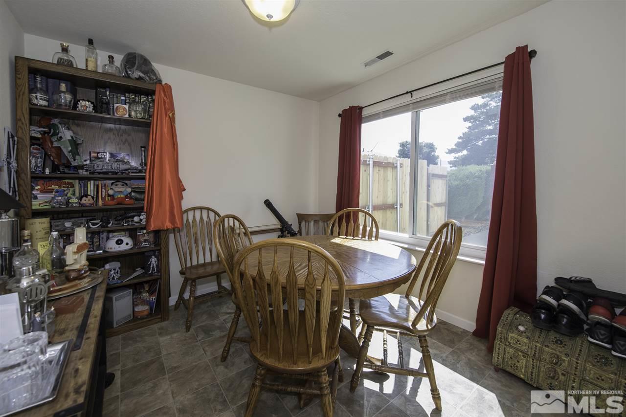 13860 Lear Boulevard Reno, NV 89506 - Photo 11 of 22 a view of a dining room with furniture window and outside view