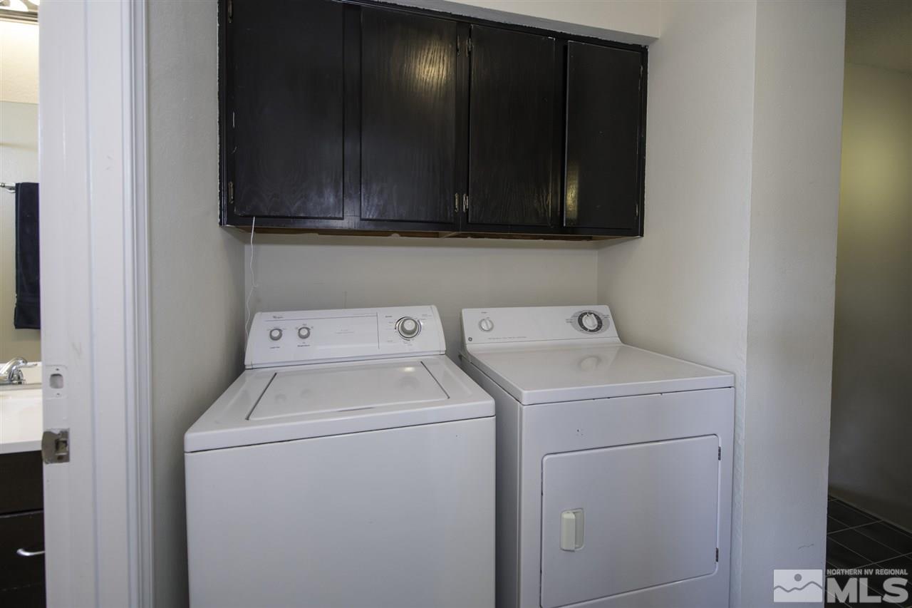 13860 Lear Boulevard Reno, NV 89506 - Photo 15 of 22 a utility room with dryer and washer