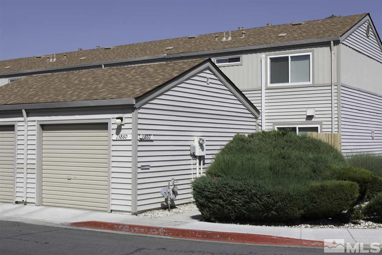 13860 Lear Boulevard Reno, NV 89506 - Photo 2 of 22 a view of a house with a garage